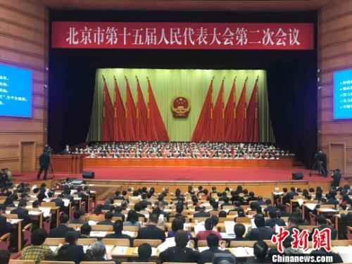 北京市十五屆人大二次會議14日開幕。北京市長陳吉寧向大會作政府工作報告?！∫?攝